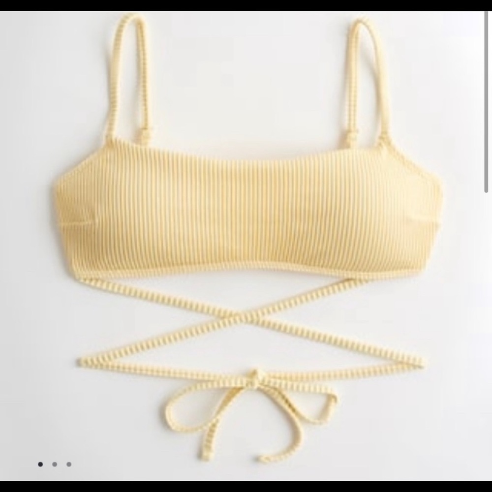 Yellow ribbed tied in back bikini top. Never worn.